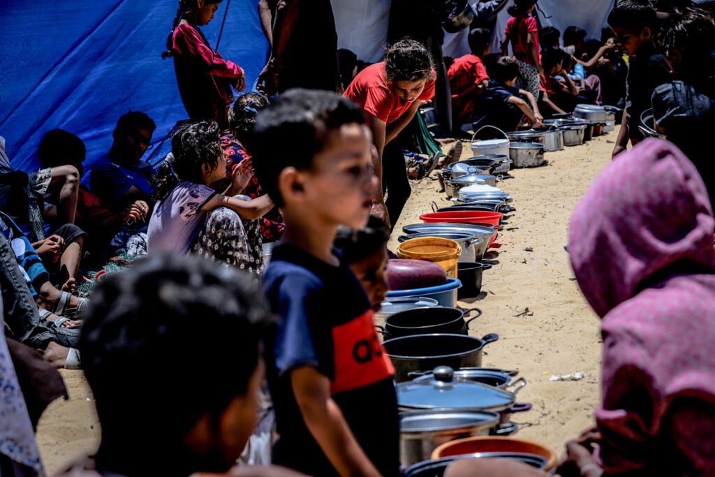 Starving Gazans swarm new U.S. and Israel-backed aid center