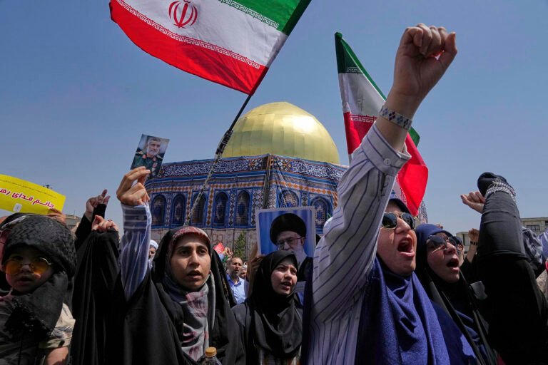 Iran launches new strikes on Israeli port city as nuclear talks underway in Europe